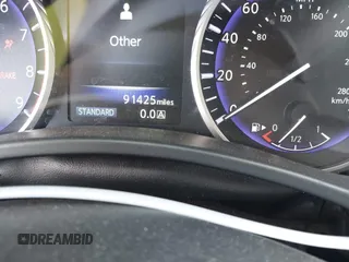 2014 Infiniti Q50 Premium z VIN JN1BV7AP9EM684709, wystawiony jako IAAI lot #41901877 z przebiegiem 91 425 mil mil oraz . Historia ofert i sprzedaży dostępna na DreamBid. Obrazek 16.