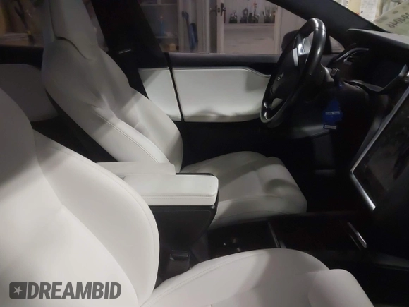 2017 Tesla Model S 100D with VIN 5YJSA1E23HF232059, listed as a IAAI auction lot 41394046 with 84,052 mi miles and . Bid and sale history available at DreamBid. Image 5.