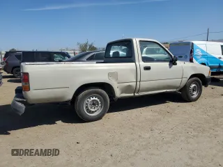 1992 Toyota Pickup z VIN JT4RN81A1N0094217, wystawiony jako Copart lot #56062545 z przebiegiem 242 256 mil mil oraz Szkoda całkowita • Salvage title. Historia ofert i sprzedaży dostępna na DreamBid. Obrazek 3.