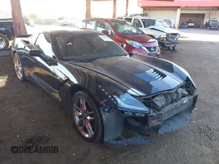 2014 Chevrolet Corvette Z51 3LT z VIN 1G1YL2D70E5104908, wystawiony jako IAAI lot #41382006 z przebiegiem 133 341 mil mil oraz . Historia ofert i sprzedaży dostępna na DreamBid. Obrazek 1.