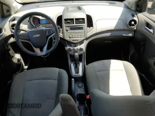 2014 Chevrolet Sonic LS with VIN 1G1JA5SH1E4241785, listed as a Copart auction lot 61914455 with 95,014 mi miles and Clean title. Bid and sale history available at DreamBid. Image 8.