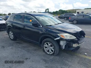 2012 Mazda CX-9 Touring with VIN JM3TB3CV1C0338681, listed as a IAAI auction lot 40458498 with 128,665 mi miles and . Bid and sale history available at DreamBid. Image 1.