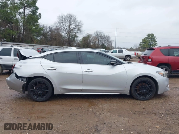 2018 Nissan Maxima SL z VIN 1N4AA6AP7JC390715, wystawiony jako IAAI lot #41397498 z przebiegiem 81 483 mil mil oraz . Historia ofert i sprzedaży dostępna na DreamBid. Obrazek 13.