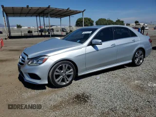 2015 Mercedes-Benz E 350 Sport with VIN WDDHF5KB2FB085598, listed as a Copart auction lot 64241205 with 119,867 mi miles and Salvage title. Bid and sale history available at DreamBid. Image 1.