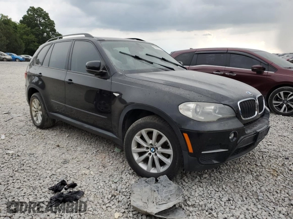 2012 BMW X5 35i with VIN 5UXZV4C59CL763577, listed as a Copart auction lot 62496155 with 148,240 mi miles and Clean title. Bid and sale history available at DreamBid. Image 4.