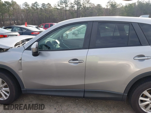 2015 Mazda CX-5 Touring with VIN JM3KE2CYXF0435583, listed as a IAAI auction lot 41737810 with 107,270 mi miles and . Bid and sale history available at DreamBid. Image 14.