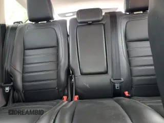 2018 Ford Escape Titanium z VIN 1FMCU9J94JUB49827, wystawiony jako Copart lot #55697385 z przebiegiem 98 682 mil mil oraz Szkoda całkowita • Salvage title. Historia ofert i sprzedaży dostępna na DreamBid. Obrazek 10.