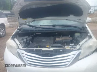 2014 Toyota Sienna XLE with VIN 5TDYK3DC2ES517663, listed as a IAAI auction lot 42171862 with 143,447 mi miles and . Bid and sale history available at DreamBid. Image 10.