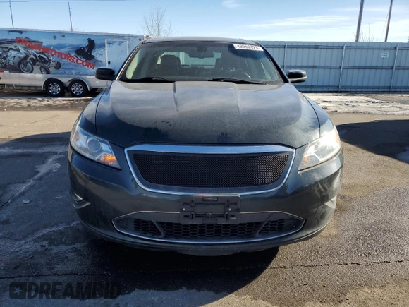 2010 Ford Taurus SHO with VIN 1FAHP2KT6AG153644, listed as a Copart auction lot 42952425 with 124,928 mi miles and Salvage title. Bid and sale history available at DreamBid. Image 5.