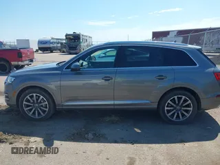 2017 Audi Q7 Premium Plus with VIN WA1LAAF73HD011755, listed as a IAAI auction lot 42684003 with 113,628 mi miles and . Bid and sale history available at DreamBid. Image 14.