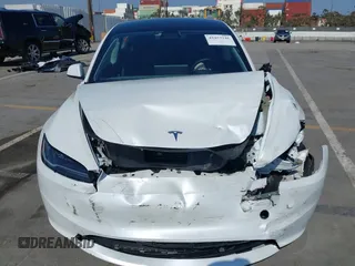 2025 Tesla Model 3 Long Range with VIN 5YJ3E1EA4SF903567, listed as a IAAI auction lot 42453246 with 19,365 mi miles and . Bid and sale history available at DreamBid. Image 6.