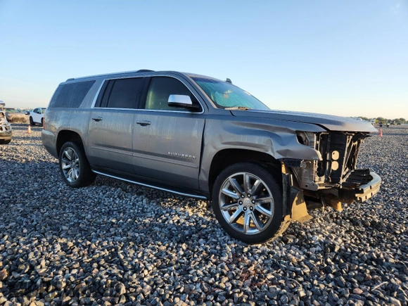 2019 Chevrolet Suburban LT with VIN 1GNSCJKC3KR129739, listed as a Copart auction lot 62377465 with 105,771 mi miles and Salvage title. Bid and sale history available at DreamBid. Image 4.