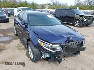 2018 Kia Optima LX z VIN 5XXGT4L35JG210032, wystawiony jako IAAI lot #41935435 z przebiegiem 63 397 mil mil oraz . Historia ofert i sprzedaży dostępna na DreamBid. Obrazek 1.
