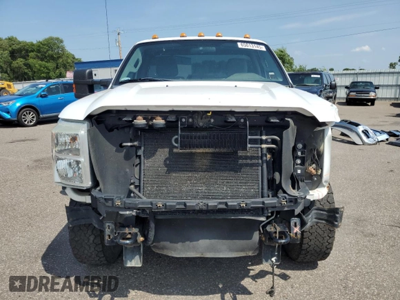 2011 Ford F-250 XL with VIN 1FTBF2B63BEB24712, listed as a Copart auction lot 65013145 with 176,681 mi miles and Salvage title. Bid and sale history available at DreamBid. Image 5.