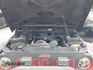 2014 Jeep Wrangler Unlimited Sahara с VIN 1C4BJWEG0EL248401, выставлен на аукционе IAAI как лот 42306970 с пробегом 134 904 миль миль и . История ставок и продаж доступна на DreamBid. Изображение 10.