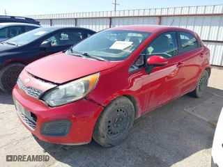 2012 Kia Rio LX with VIN KNADM5A35C6058809, listed as a IAAI auction lot 42052025 with 124,266 mi miles. Bid and sale history available at carsss.com. Image 2.