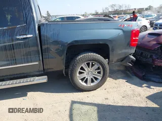 2018 Chevrolet Silverado 1500 High Country with VIN 3GCUKTEC8JG308353, listed as a IAAI auction lot 40714183 with 88,711 mi miles and . Bid and sale history available at DreamBid. Image 6.