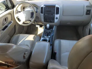 2005 Mercury Mariner Luxury z VIN 4M2YU57105DJ18837, wystawiony jako Copart lot #52105545 z przebiegiem 177 049 mil mil oraz Szkoda całkowita • Salvage title. Historia ofert i sprzedaży dostępna na DreamBid. Obrazek 8.