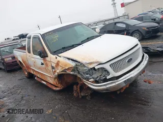 2001 Ford F-150 XL z VIN 1FTRX17L51NA07099, wystawiony jako IAAI lot #41618275 z przebiegiem 161 169 mil mil oraz . Historia ofert i sprzedaży dostępna na DreamBid. Obrazek 1.