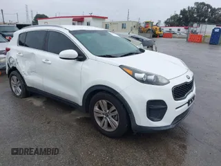 2019 Kia Sportage LX with VIN KNDPM3AC6K7508870, listed as a IAAI auction lot 41808770 with 104,141 mi miles. Bid and sale history available at carsss.com. Image 1.