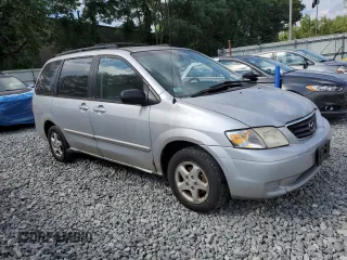2000 Mazda MPV DX with VIN JM3LW28GXY0160334, listed as a Copart auction lot 65146065 with 137,432 mi miles and Clean title. Bid and sale history available at DreamBid. Image 4.