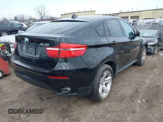2014 BMW X6 xDrive35i z VIN 5UXFG2C56E0C45631, wystawiony jako IAAI lot #41967186 z przebiegiem 86 773 mil mil oraz . Historia ofert i sprzedaży dostępna na DreamBid. Obrazek 4.