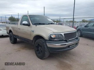 1999 Ford F-150 Work Series with VIN 1FTRF17WXXKA74403, listed as a IAAI auction lot 41525113 with 1 mi miles. Bid and sale history available at carsss.com. Image 1.