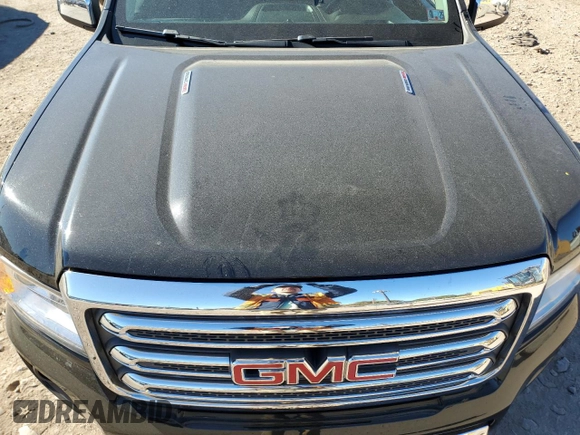 2016 GMC Canyon 4WD SLT with VIN 1GTP6DE11G1357147, listed as a Copart auction lot 77835344 with 106,890 mi miles and Salvage Title. Bid and sale history available at carsss.com. Image 12.