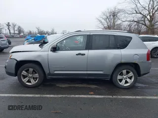 2014 Jeep Compass Sport with VIN 1C4NJDBB8ED734667, listed as a IAAI auction lot 41836914 with 221,028 mi miles. Bid and sale history available at carsss.com. Image 14.