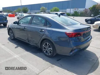 2023 Kia Forte LXS with VIN 3KPF24AD7PE634209, listed as a IAAI auction lot 42046423 with 37,542 mi miles and . Bid and sale history available at DreamBid. Image 3.