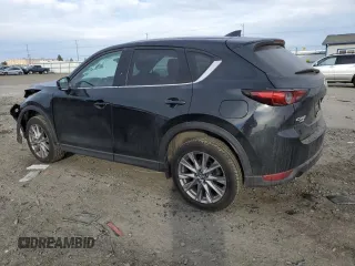 2019 Mazda CX-5 Grand Touring with VIN JM3KFBDM9K1650840, listed as a Copart auction lot 41929185 with 61,814 mi miles and Salvage Title. Bid and sale history available at carsss.com. Image 2.