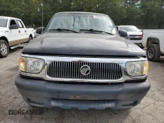 1999 Mercury Mountaineer z VIN 4M2DU52P9XUJ10152, wystawiony jako Copart lot #76283584 z przebiegiem 32 199 mil mil oraz Tytuł czysty. Historia ofert i sprzedaży dostępna na DreamBid. Obrazek 5.