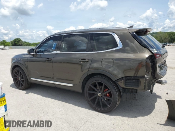 2020 Kia Telluride EX with VIN 5XYP34HC4LG004210, listed as a Copart auction lot 61686495 with 87,198 mi miles and Salvage title. Bid and sale history available at DreamBid. Image 2.