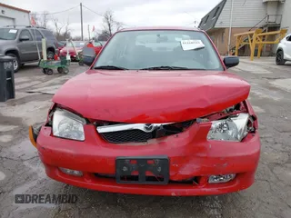 2000 Mazda Protege DX with VIN JM1BJ2224Y0277889, listed as a IAAI auction lot 41160593 with 124,586 mi miles and . Bid and sale history available at DreamBid. Image 12.