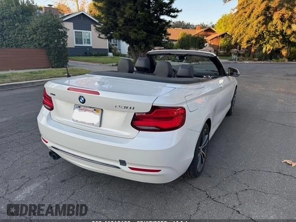 2018 BMW 2 Series 230i xDrive with VIN WBA2K1C55JVB64560, listed as a IAAI auction lot 41616166 with 69,414 mi miles. Bid and sale history available at carsss.com. Image 4.
