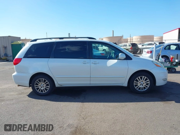2010 Toyota Sienna XLE with VIN 5TDYK4CC3AS336590, listed as a IAAI auction lot 41798194 with 230,707 mi miles. Bid and sale history available at carsss.com. Image 13.