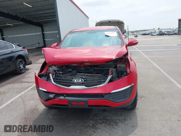 2013 Kia Sportage LX with VIN KNDPB3A24D7485007, listed as a IAAI auction lot 42446887 with 106,033 mi miles and . Bid and sale history available at DreamBid. Image 13.