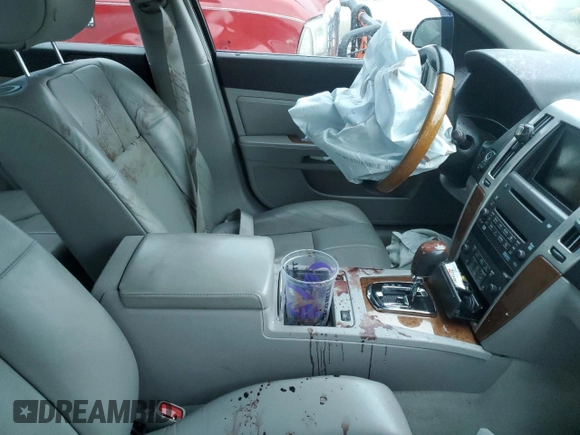 2011 Cadillac STS RWD z VIN 1G6DW6ED1B0111158, wystawiony jako Copart lot #87607715 z przebiegiem Nie podano mil oraz Szkoda całkowita • Salvage title. Historia ofert i sprzedaży dostępna na DreamBid. Obrazek 7.