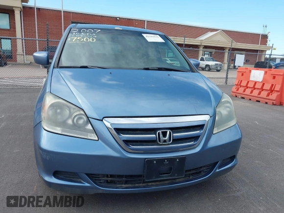 2007 Honda Odyssey EX-L z VIN 5FNRL38757B121989, wystawiony jako IAAI lot #42323131 z przebiegiem 174 906 mil mil oraz . Historia ofert i sprzedaży dostępna na DreamBid. Obrazek 6.