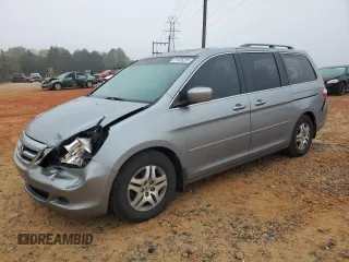 2006 Honda Odyssey EX-L with VIN 5FNRL38786B098075, listed as a Copart auction lot 51526235 with 164,192 mi miles and Salvage Title. Bid and sale history available at carsss.com. Image 1.