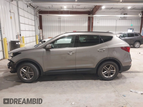 2017 Hyundai Santa Fe 2.4L z VIN 5XYZUDLBXHG447389, wystawiony jako IAAI lot #42249551 z przebiegiem 178 084 mil mil oraz . Historia ofert i sprzedaży dostępna na DreamBid. Obrazek 15.