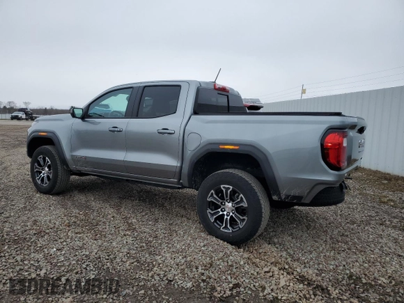 2023 GMC Canyon 4WD AT4 with VIN 1GTP6DEK5P1170230, listed as a Copart auction lot 52767295 with 26,769 mi miles and Salvage Title. Bid and sale history available at carsss.com. Image 2.
