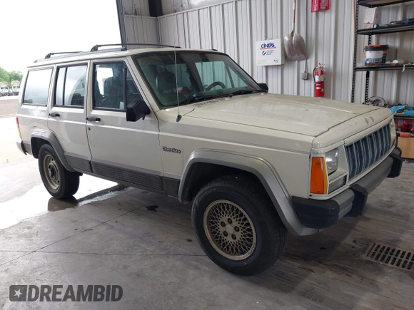 1996 Jeep Cherokee Country z VIN 1J4FT78S0TL280645, wystawiony jako IAAI lot #42340813 z przebiegiem 288 418 mil mil oraz . Historia ofert i sprzedaży dostępna na DreamBid. Obrazek 1.