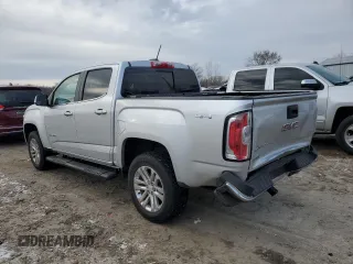 2019 GMC Canyon 4WD SLT with VIN 1GTG6DEN7K1134168, listed as a Copart auction lot 86510834 with 61,889 mi miles and Salvage Title. Bid and sale history available at carsss.com. Image 2.