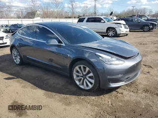 2019 Tesla Model 3 Mid Range with VIN 5YJ3E1EA6KF312754, listed as a Copart auction lot 50403855 with 148,217 mi miles and Salvage Title. Bid and sale history available at carsss.com. Image 4.