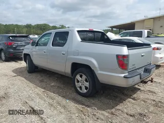 2014 Honda Ridgeline RTL with VIN 5FPYK1F53EB013752, listed as a IAAI auction lot 41886851 with 89,038 mi miles and . Bid and sale history available at DreamBid. Image 3.