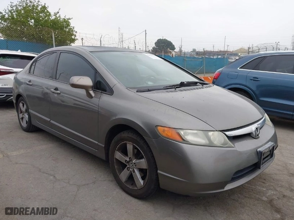 2007 Honda Civic Sdn EX with VIN 1HGFA16867L087102, listed as a IAAI auction lot 42021975 with 174,215 mi miles. Bid and sale history available at carsss.com. Image 1.