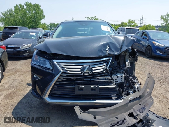2019 Lexus RX 350 with VIN 2T2BZMCA5KC193082, listed as a IAAI auction lot 42400440 with 80,405 mi miles and . Bid and sale history available at DreamBid. Image 12.