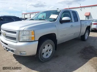 2011 Chevrolet Silverado 1500 LT with VIN 1GCRKSE37BZ249278, listed as a IAAI auction lot 41945372 with 230,962 mi miles. Bid and sale history available at carsss.com. Image 2.