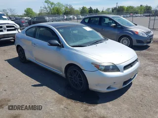 2006 Scion tC with VIN JTKDE177060139123, listed as a IAAI auction lot 42075140 with 218,391 mi miles. Bid and sale history available at carsss.com. Image 1.